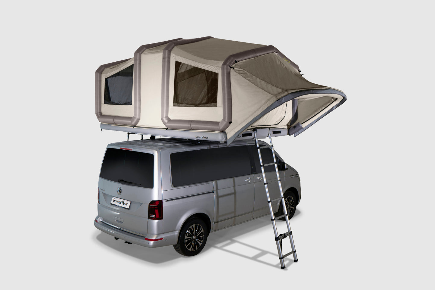 Olive GT Skyloft tent fully inflated and set up on top of a van.